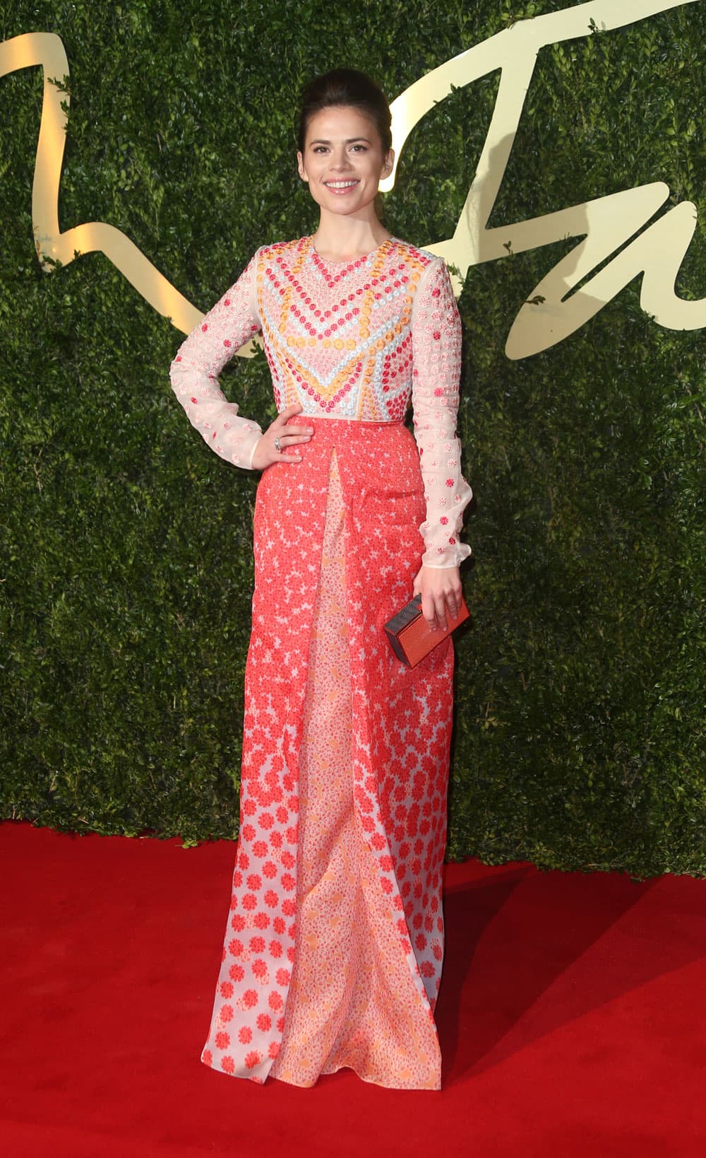 British actress Hayley Atwell poses for photographers as she arrives for the London Coliseum for the 2013 British Fashion Awards, in central London.