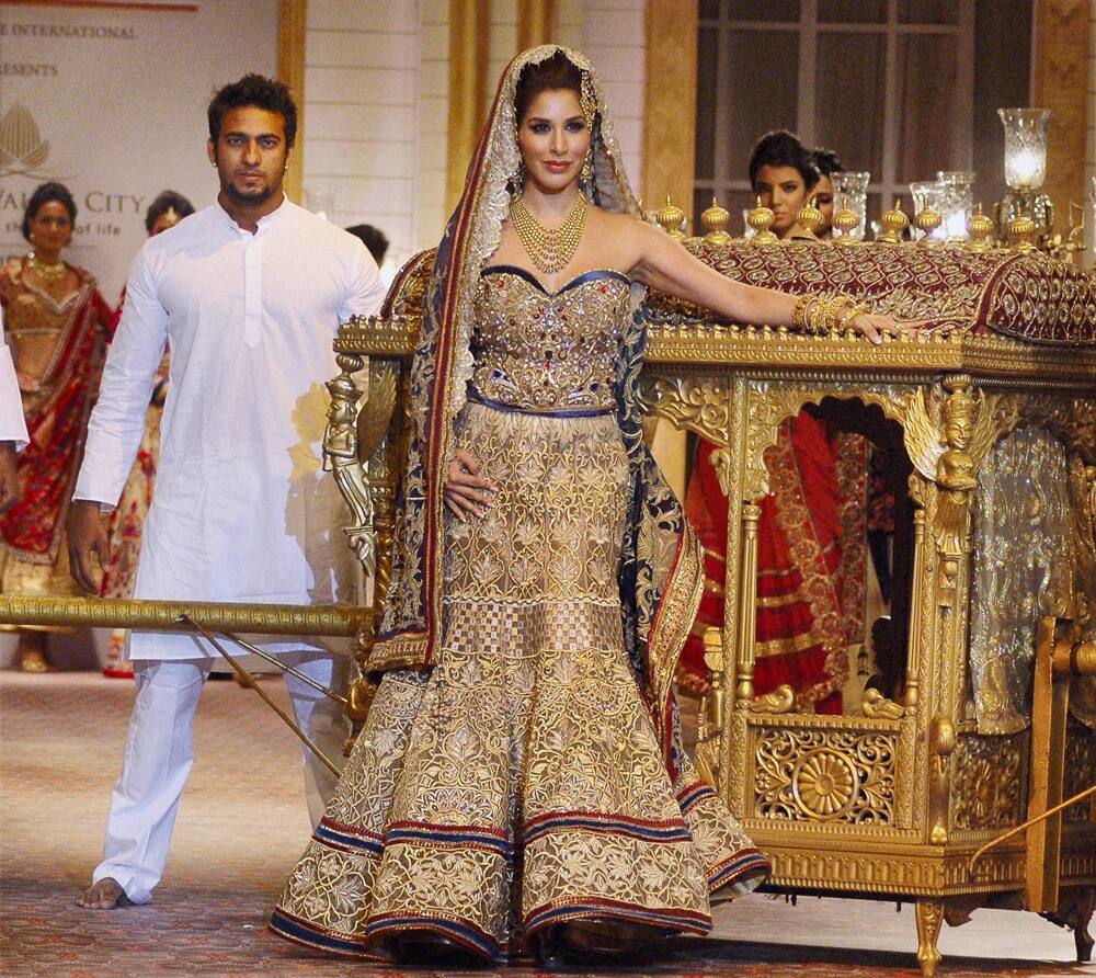 Bollywood actress Sophie Choudry walks the ramp at the India Bridal Fashion Week in Mumbai.