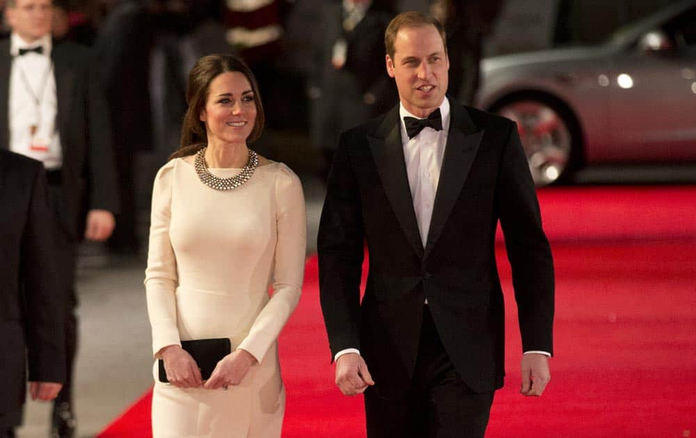 Britain's Kate, Duchess of Cambridge and her husband Prince William arrive to attend the UK premiere of the movie 