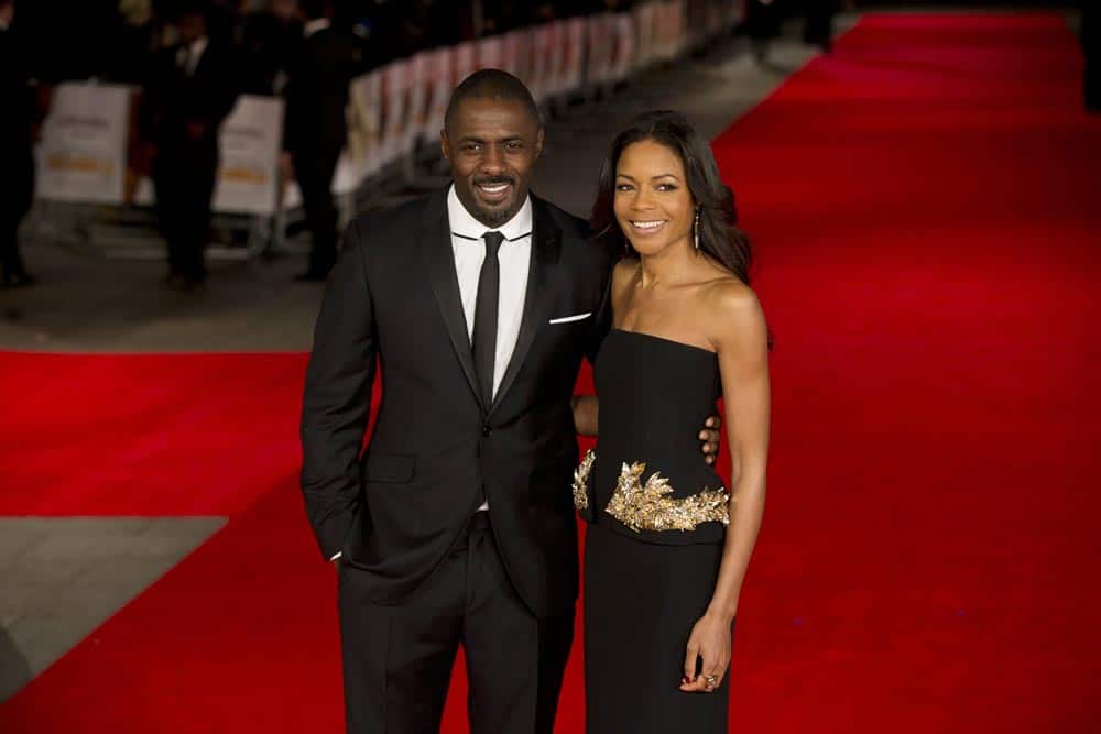 Idris Elba, left, who plays Nelson Mandela and Naomie Harris who plays Winnie Mandela pose for photographers at the UK premiere of the movie 