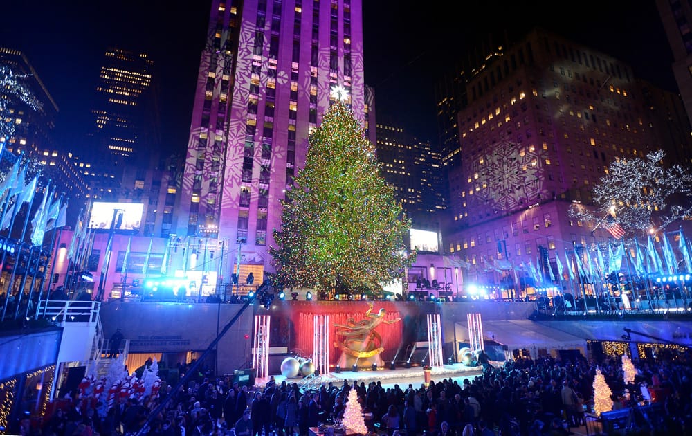 The Rockefeller Center Christmas tree is lit during a ceremony in New York. Some 45,000 energy efficient LED lights adorn the 76-foot tree.