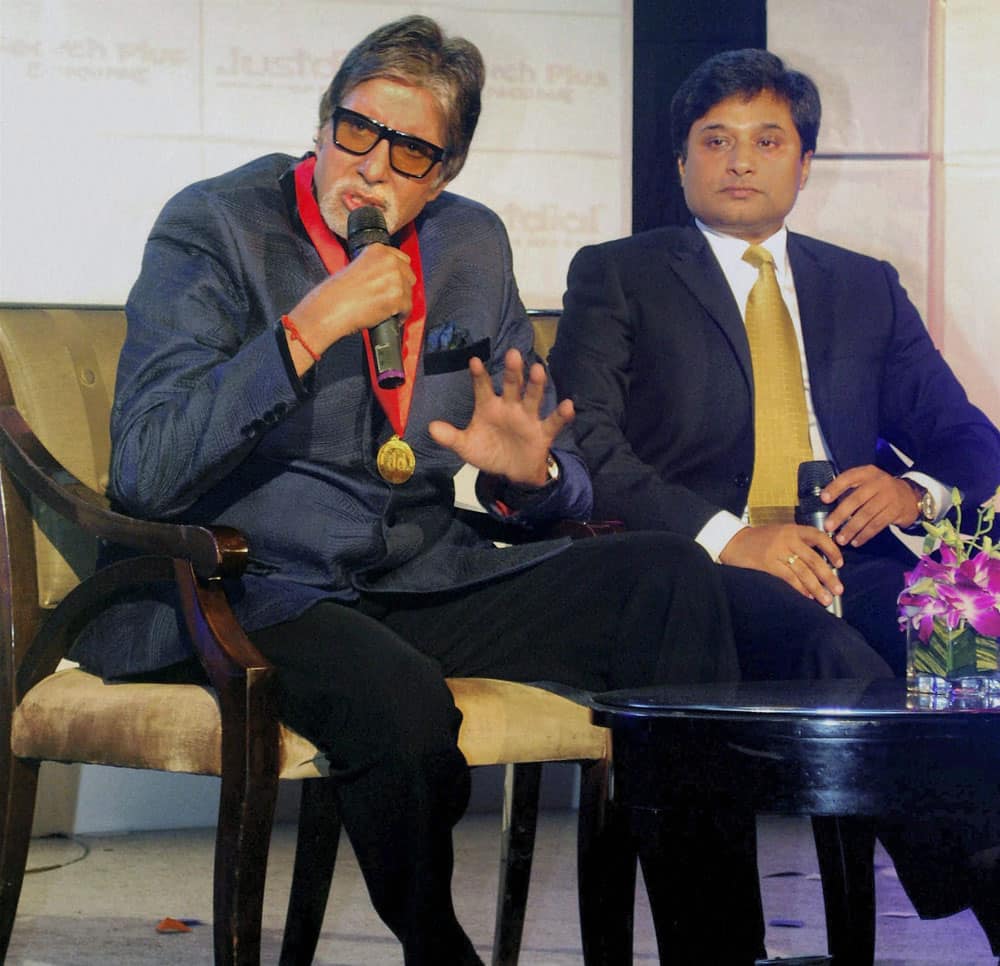 Bollywood actor Amitabh Bachchan and VSS Mani, CEO, Justdial, at a launch event in Mumbai.