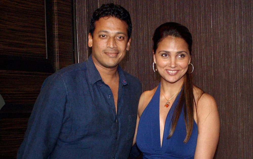 Tennis player Mahesh Bhuparti with wife Lara Dutta during a promotional event in Mumbai.