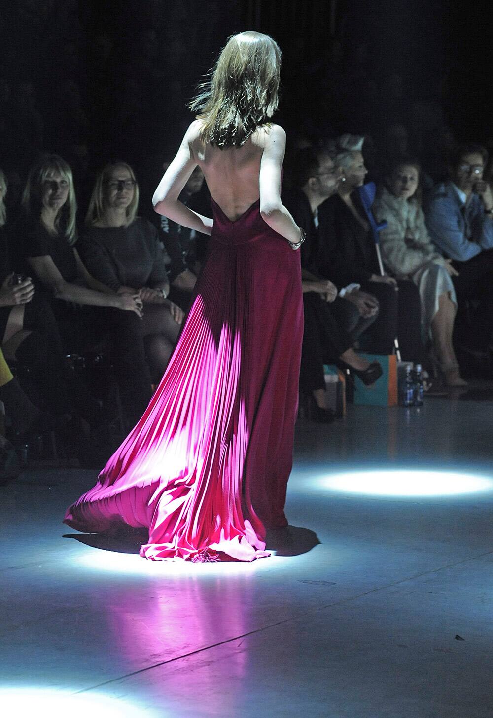 A model presents a creation from the Spring and Summer 2014 collection by Polish fashion designer Lukasz Jemiol during a show in Warsaw, Poland.