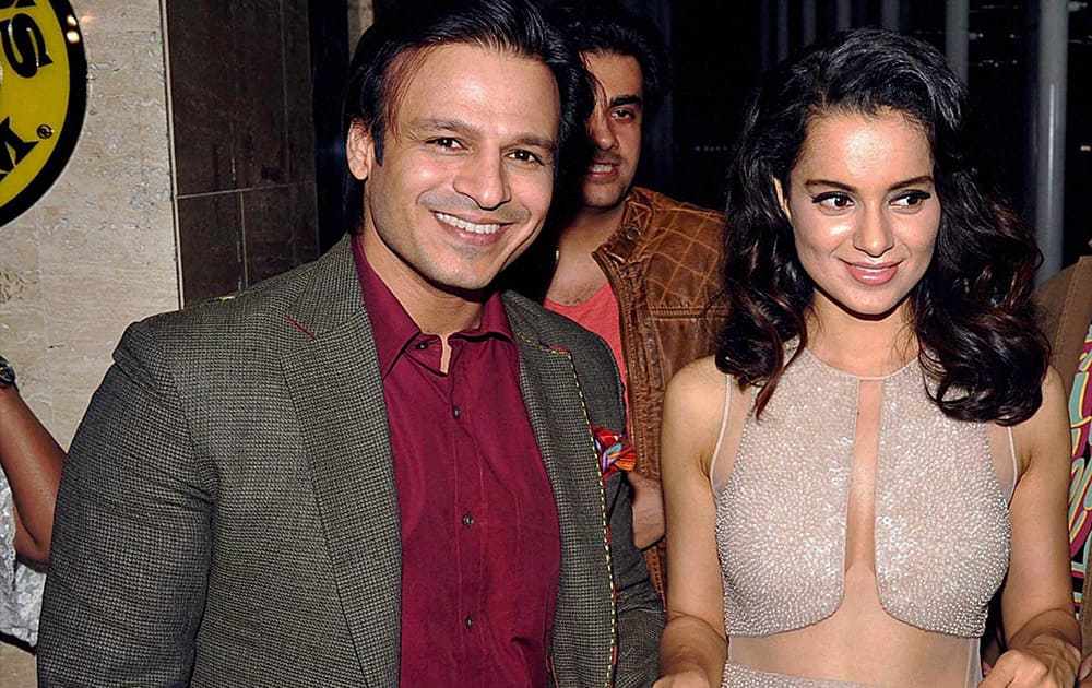 Vivek Oberoi and Kangna Ranaut arriving at a fashion event in Mumbai.