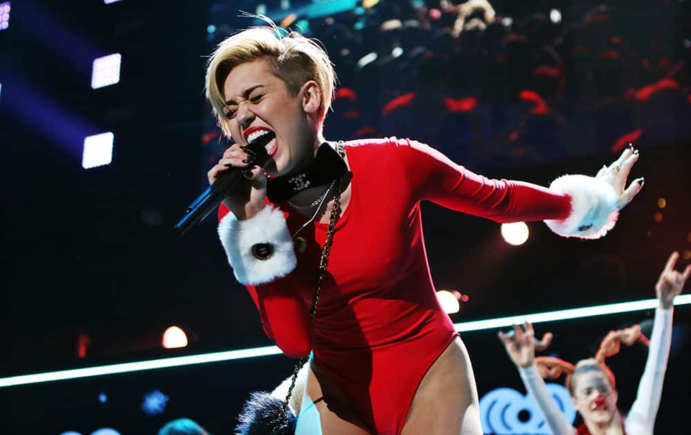 Miley Cyrus performing as part of the Power 96.1's Jingle Ball 2013 at Philips Arena, in Atlanta.