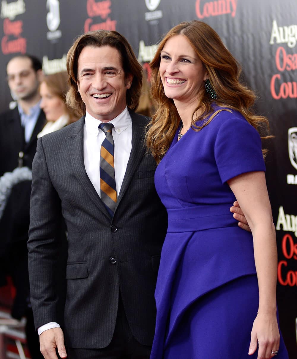 Actors Dermot Mulroney and Julia Roberts attend the 'August: Osage County' premiere at the Ziegfeld Theatre.