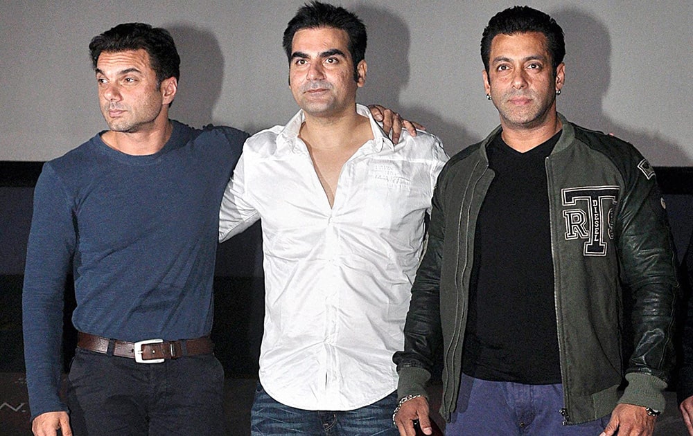 Salman Khan with brother Arbaaz Khan and Sohail Khan during the theatrical trailer launch of his upcoming movie 'Jai Ho', in Mumbai.