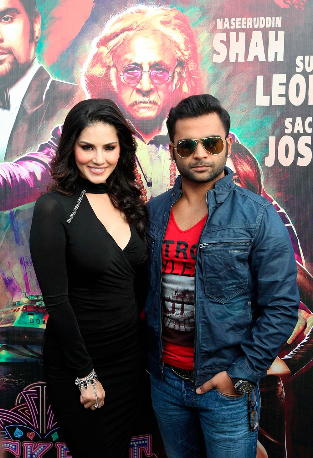 Sunny Leone with actor Sachin Joshi during a promotional event for their upcoming film 'Jackpot', in Bengaluru.