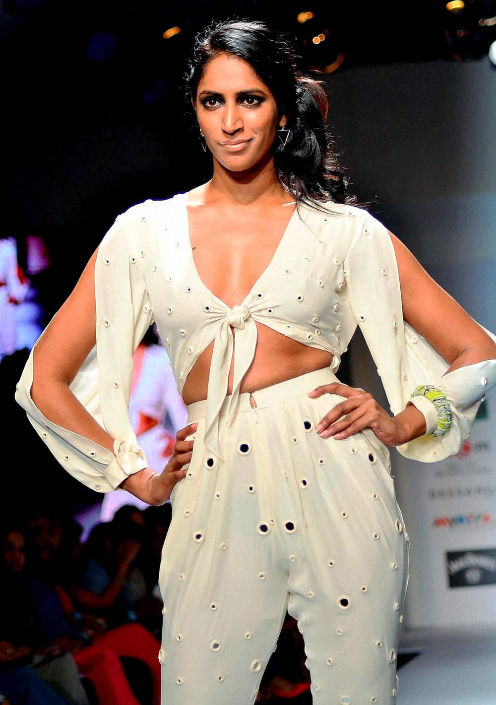 A model walks the ramp during the 3rd edition of India Resortwear Fashion Week (IRFW) 2013 in Mumbai.