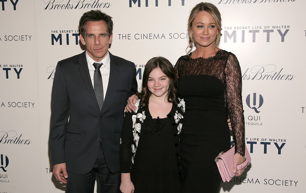 Actor Ben Stiller, left, his wife, actress Christine Taylor, right, and their daughter Ella Olivia Stiller, center, attend a screening of `The Secret Life of Walter Mitty` presented by 20th Century Fox with the Cinema Society & Brooks Brothers in New York. 