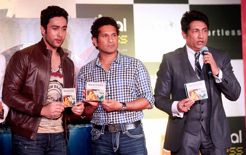 Former Indian captain Sachin Tendulkar launches the music of Shekhar Suman's 'Heartless' in Mumbai. Shekhar Suman's son Adhyayan Suman is also seen in the picture. 