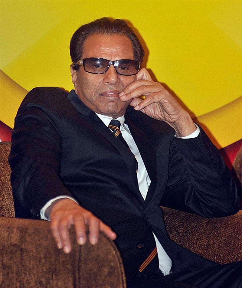 Bollywood actor Dharmendra gestures during the Okaya Award for Lifetime Achievement 2013 function in Mumbai.