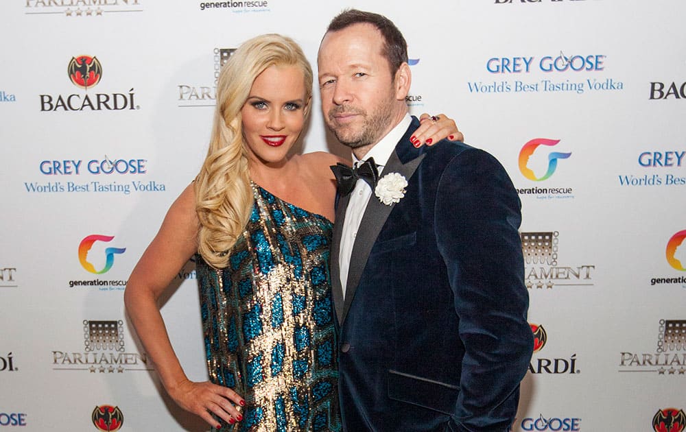 Jenny McCarthy, left, and Donnie Wahlberg pose at the Parliament night club for her bash to raise funds for the nonprofit Generation Rescue, which supports families dealing with autism in Chicago.