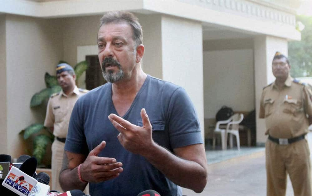 Actor Sanjay Dutt interacts with media after he was granted a month-long parole, the Bollywood actor was released from Pune's Yerwada Jail earlier.