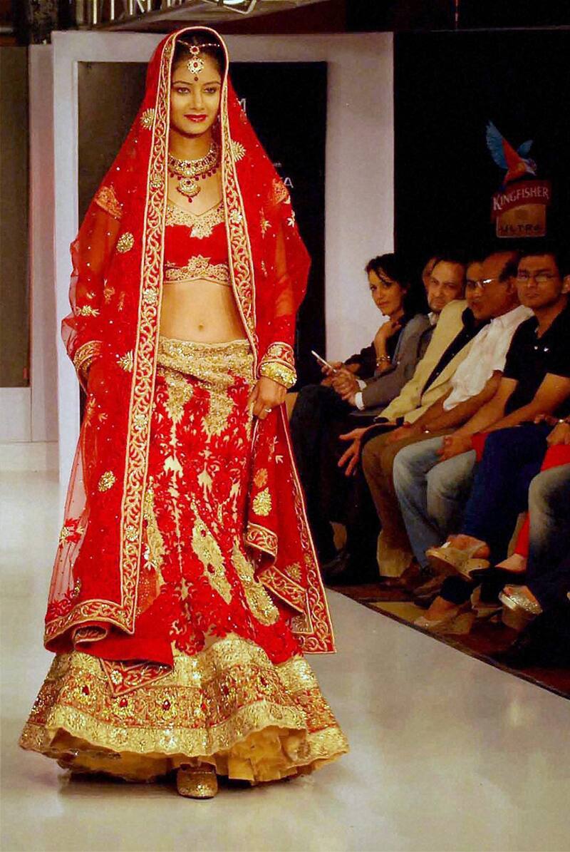 A model walks the ramp during the on-going Hyderabad International Fashion Week in Hyderabad.