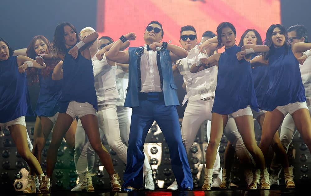 South Korean rapper PSY, center, performs during his concert `All Night Stand` in Seoul, South Korea.