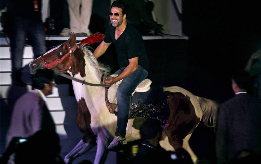 Bollywood actor Akshay Kumar riding a horse during the pre-centenary celebrations of East Bengal Club at Salt Lake stadium in Kolkata.