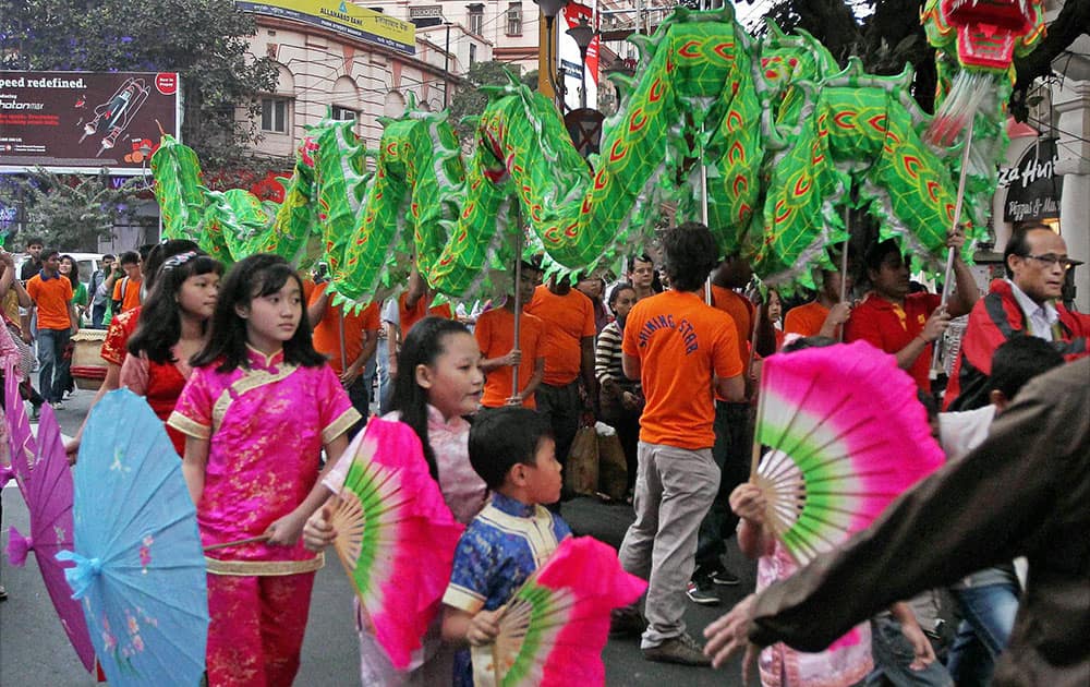 People take part in Christmas celebrations in Kolkata.