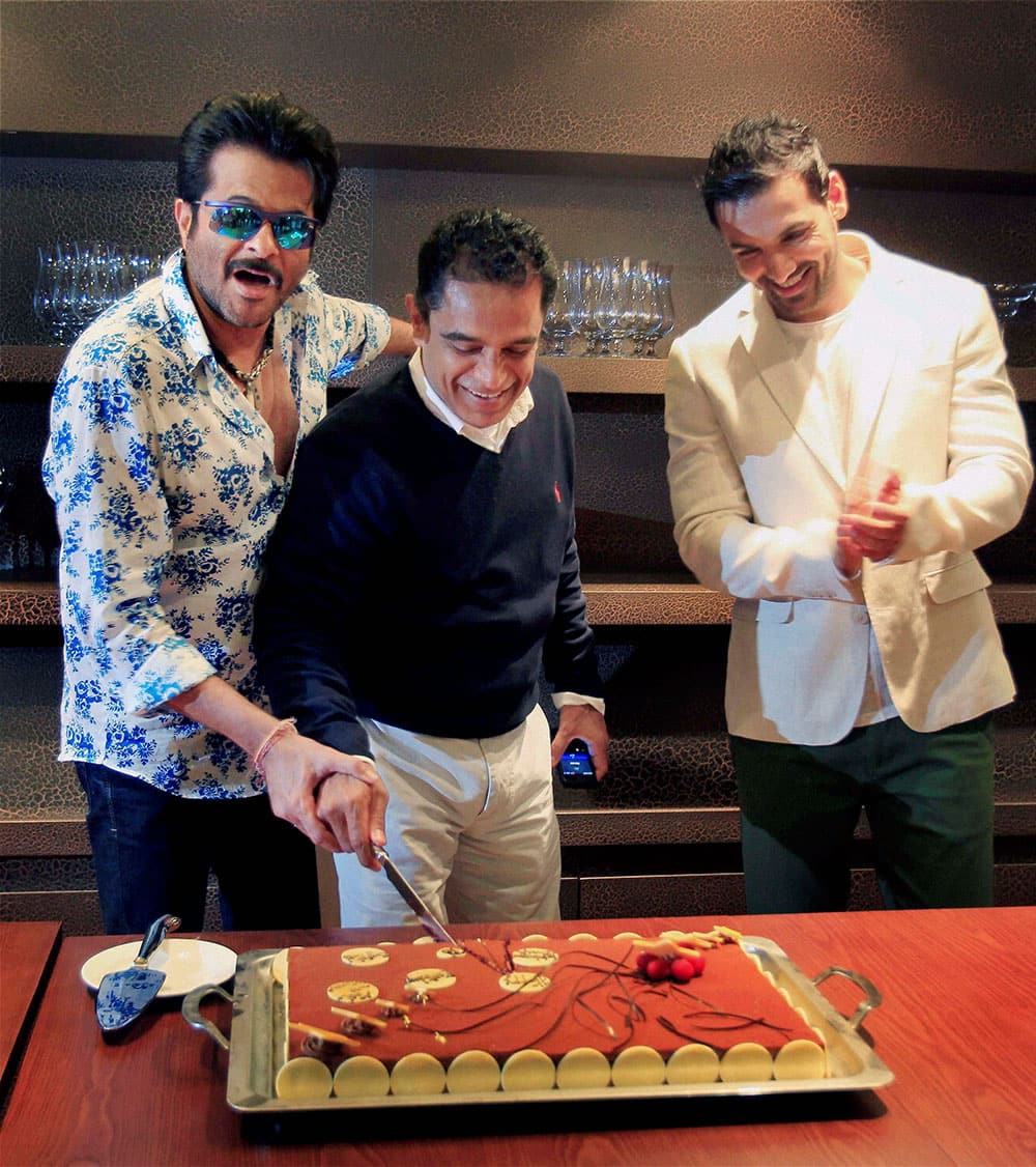 Bollywood actors John Abraham and Anil Kapoor with producer of film 'Welcome Back' Firoz Nadiadwala, celebrate their birthdays on sets of the film at a hotel in Dubai recently.