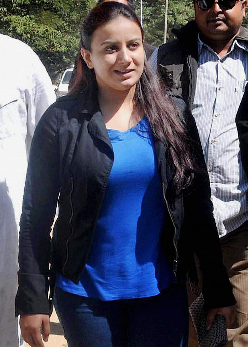 Kannada actress Pooja Gandhi arrives to appear before the court in Chikmagalur in Karnataka on Monday in connection with a case of violation of model code of conduct.