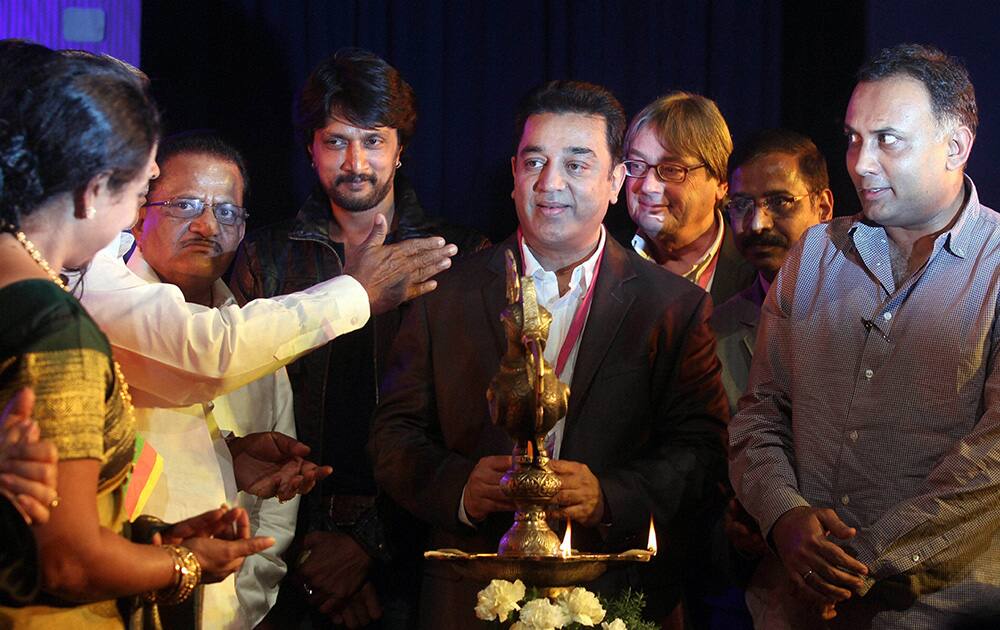 Karnataka Chief Minister Siddaramaiah, Padamsri Actor Kamal Hasan, Kannada Actor Ramesh Arvind, Sudeep and State Minister Dinesh Gundurao during the inauguration of the Bangalore International Film Festival in Bengaluru.