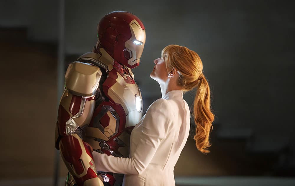 This film publicity image released by Disney-Marvel Studios shows Robert Downey Jr. as Tony Stark/Iron Man and Gwyneth Paltrow as Pepper Potts with in a scene from 