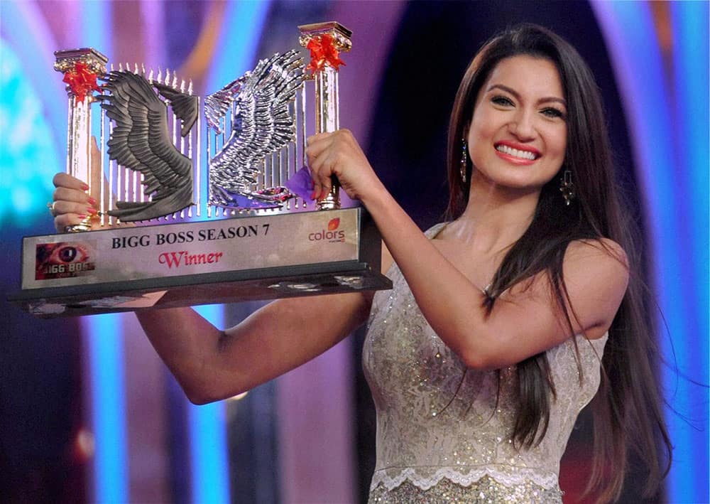 Big Boss season 7 winner Gauhar Khan display award during the grand finale at Lonavala.