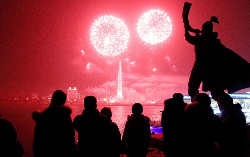 Fireworks explode over Juche Tower and the Taedong River in Pyongyang, North Korea to celebrate the New Year.