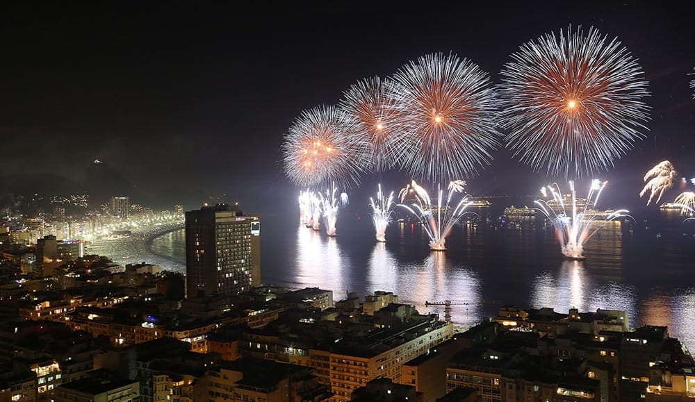 Fireworks light the sky over Copacabana beach during New Year's Eve celebrations in Rio de Janeiro, Brazil.