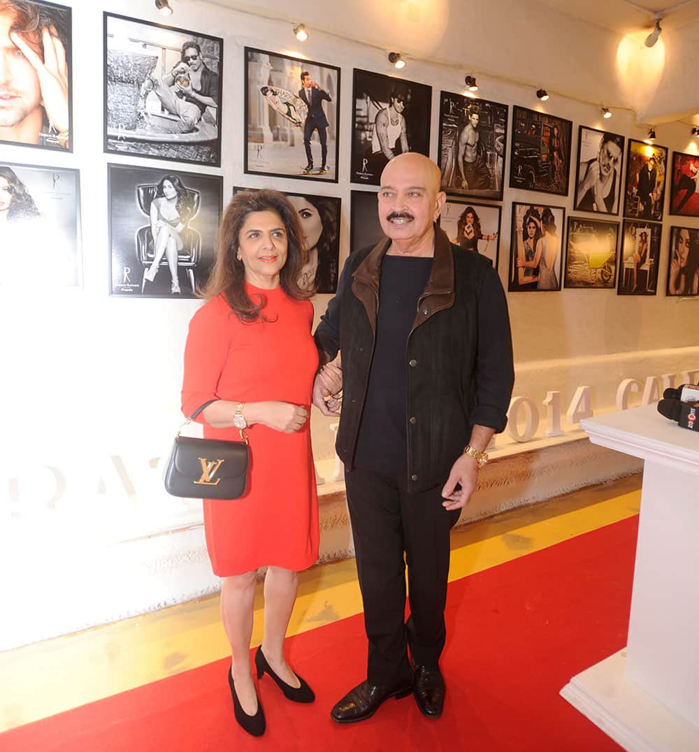 Pinky Roshan (L) and Rakesh Roshan (R) during the launch of Dabboo Ratnani's calendar 2014 at Olive, Bandra in Mumbai. Pic Courtesy: DNA