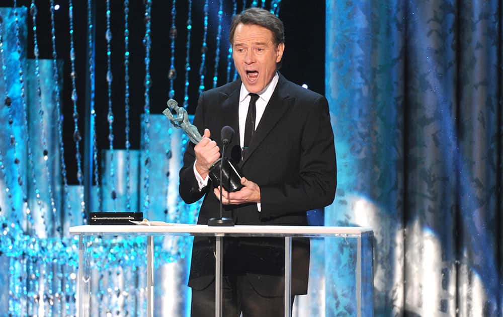 Bryan Cranston accepts the award for outstanding performance by a male actor in a drama series for `Breaking Bad` at the 20th annual Screen Actors Guild Awards at the Shrine Auditorium.