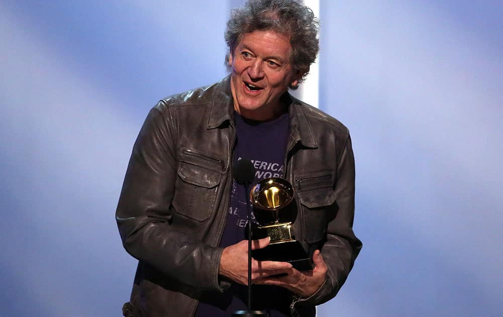 Rodney Crowell poses accepts the award for best Americana album for `Old Yellow Moon` at the pre-telecast of the 56th annual Grammy Awards.