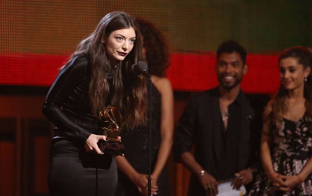 Lorde accepts the award for best pop solo performance for `Royals` at the 56th annual Grammy Awards at Staples Center.