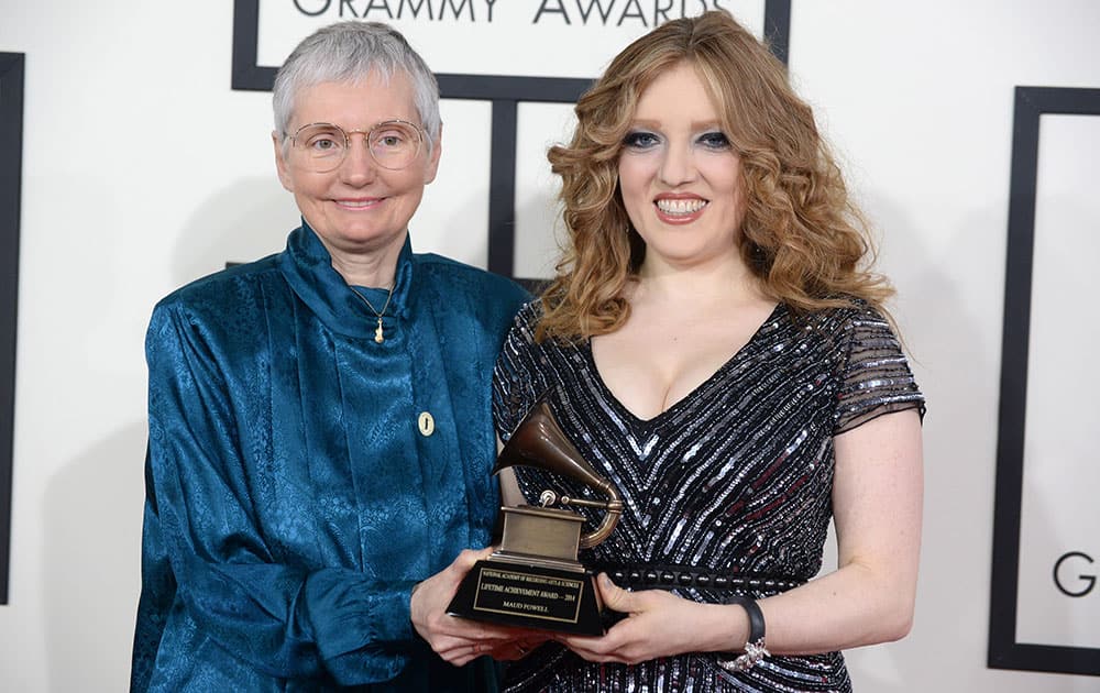 Karen A. Shaffer and Rachel Barton Pine with the Lifetime Achievement Grammy on behalf of Maud Powell arrive at the 56th annual Grammy Awards.