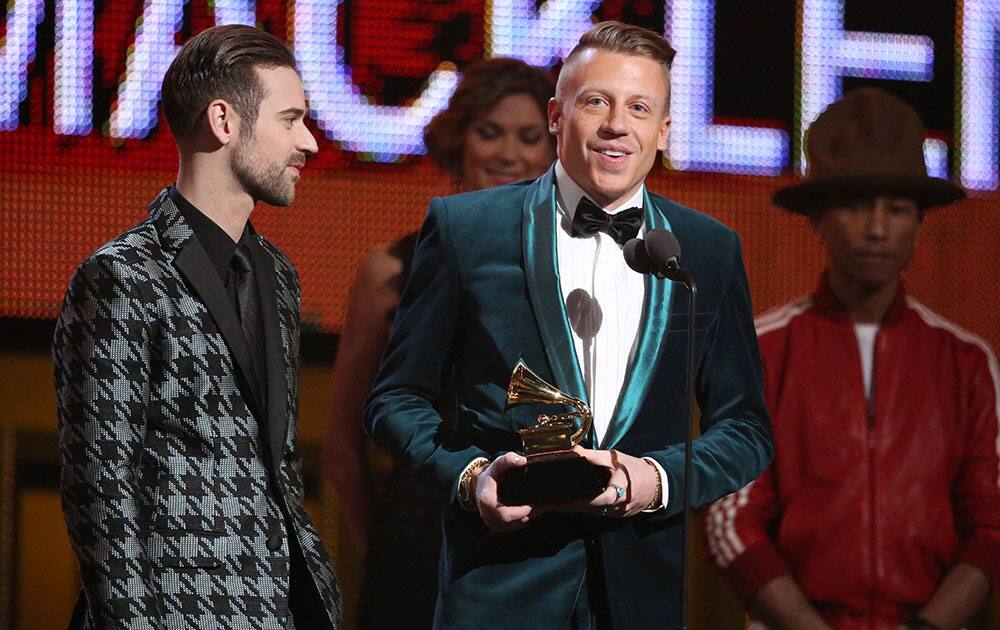 Ryan Lewis and Macklemore accept the award for best new artist at the 56th annual Grammy Awards at Staples Center.