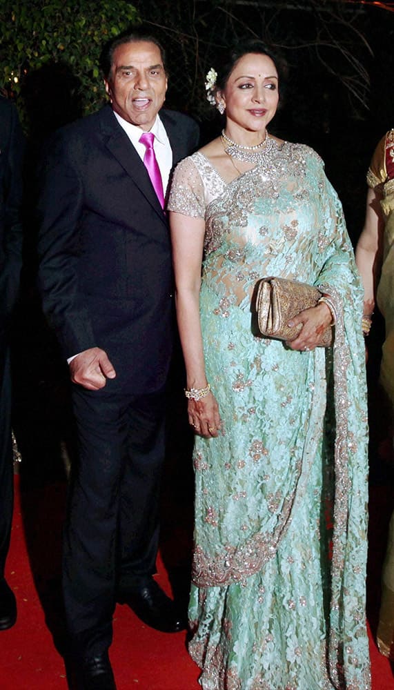 Bollywood actors Hema Malini and Dharmendra at their younger daughter Ahana Deol and Vaibhav Vora's wedding ceremony in Mumbai.