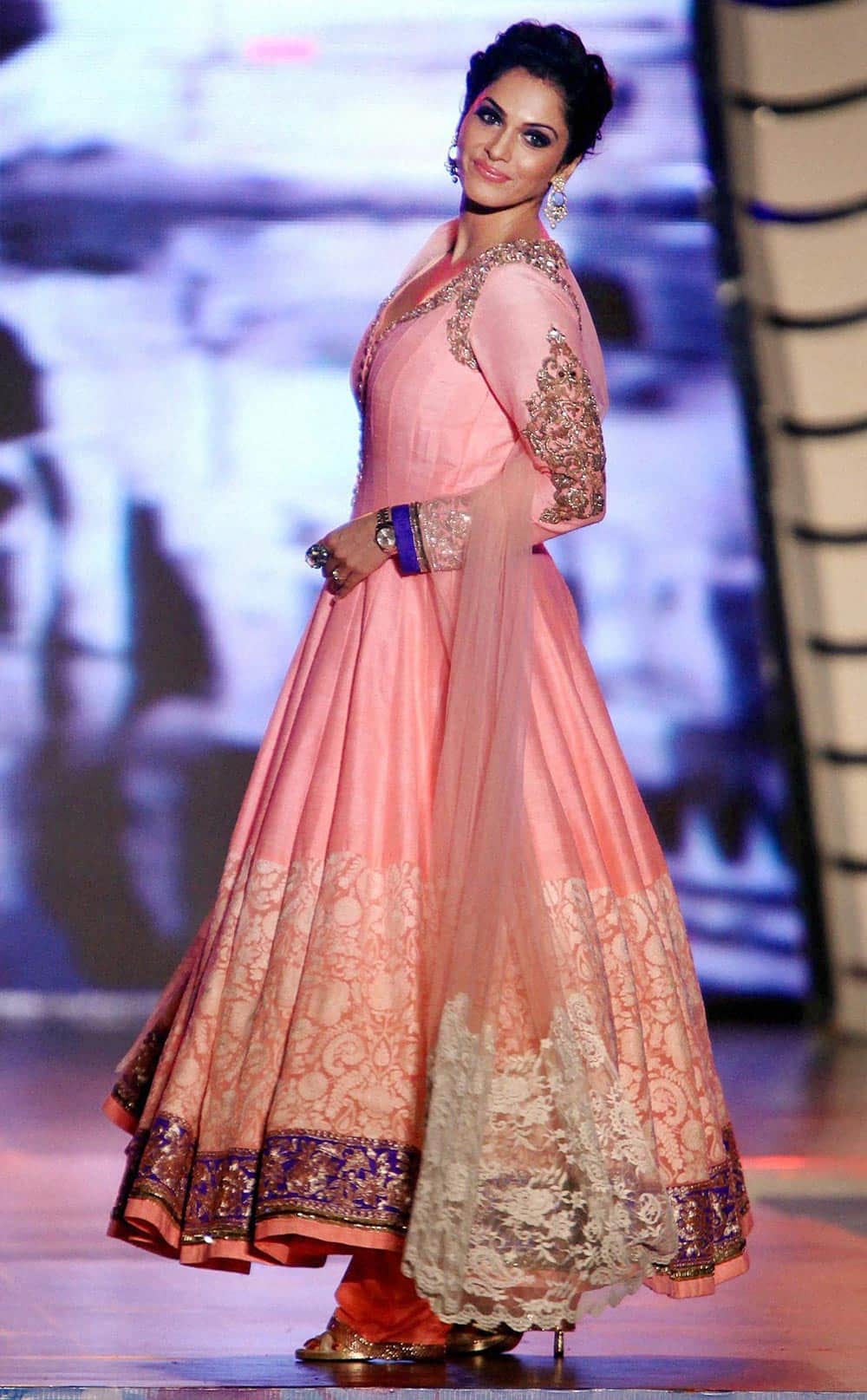Bollywood actress Isha Koppikar walks the ramp for ‘Save & Empower the Girl Child’ initiative by Lilavati hospital in Mumbai.