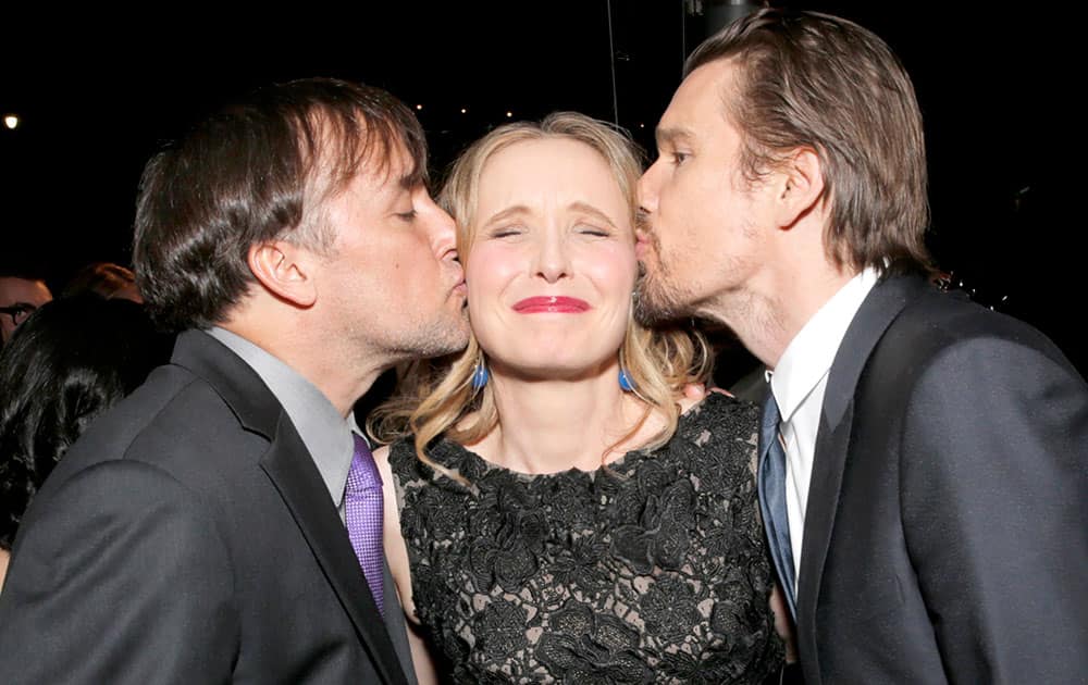 From left, Richard Linklater, Julie Delpy, and Ethan Hawke attend The Hollywood Reporter Nominees Night presented by Cadillac, Bing, Delta, Pandora jewelry, Qua, and Zenith, at Spago in Beverly Hills, Calif.