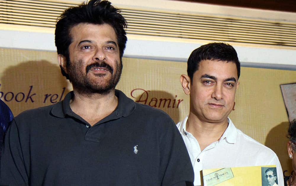 Bollywood actors Anil Kapoor and Aamir Khan at the launch of a book 'Sagar Movie Tone' in Mumbai.