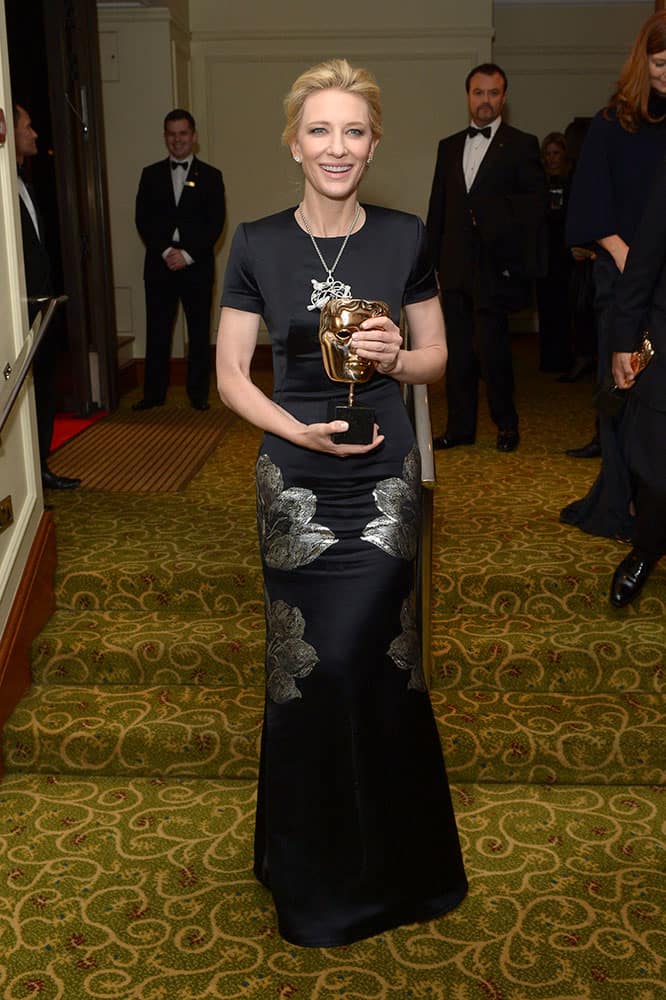 Australian actress Cate Blanchett poses for photographers with her Bafta award for best actress for her role in Blue Jasmine as she arrives a the EE British Academy Film Awards Official After Party at the Grosvenor House Hotel.