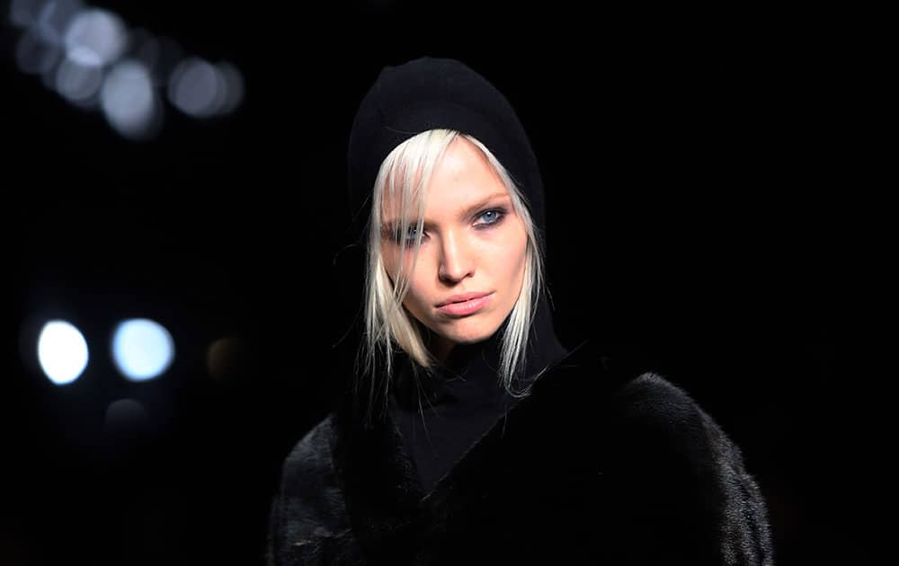 A model wears a design created by Tom Ford during London Fashion Week Autumn/Winter 2014.