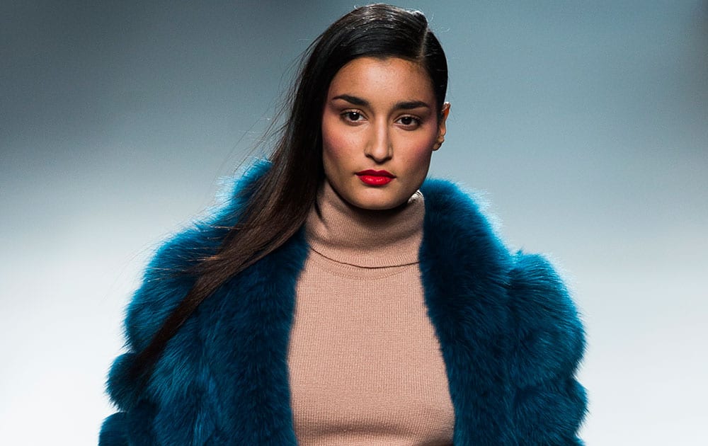 A model displays an Autumn/Winter design by Miguel Marinero during Madrid's Fashion Week.