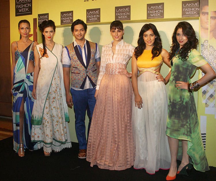 Models pose during the preview of Lakme Fashion Week Summer Resort 2014 in Mumbai.