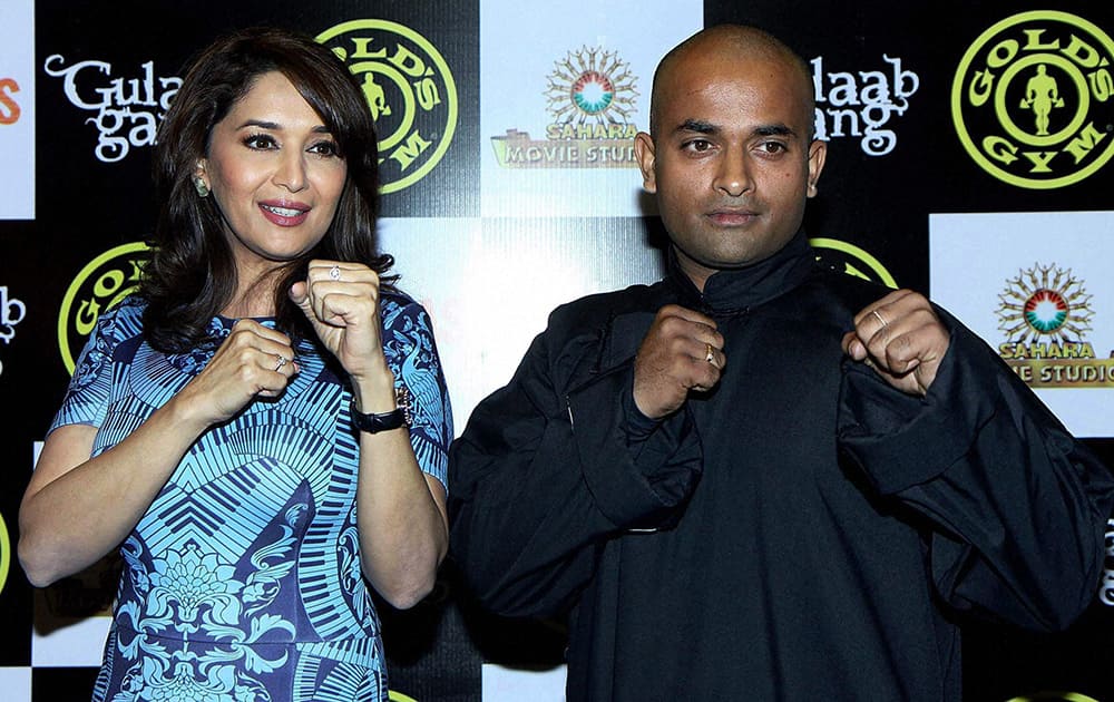 Madhuri Dixit with Kanishka Sharma (Shailon Martial Art expert) performs self defense techniques for women from her film.