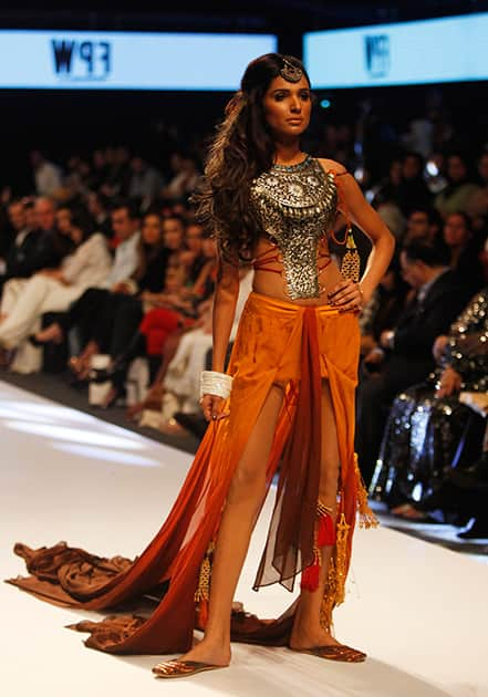 A Pakistani model presents a creation by designer Adel Emmanucl, on the first day of Fashion Pakistan Week, in Karachi.