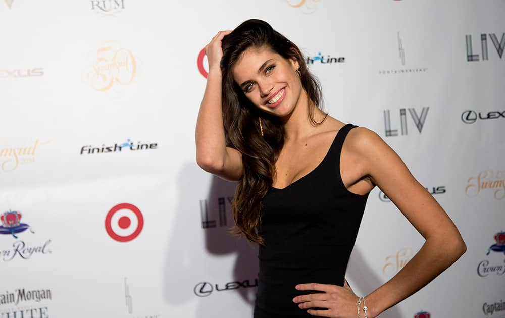 Model Sara Sampaio poses for photos, in Miami Beach, Fla. Several 2014 Sports Illustrated Swimsuit models walked the red carpet to celebrate the 50th Anniversary of the Sports Illustrated Swimsuit issue.