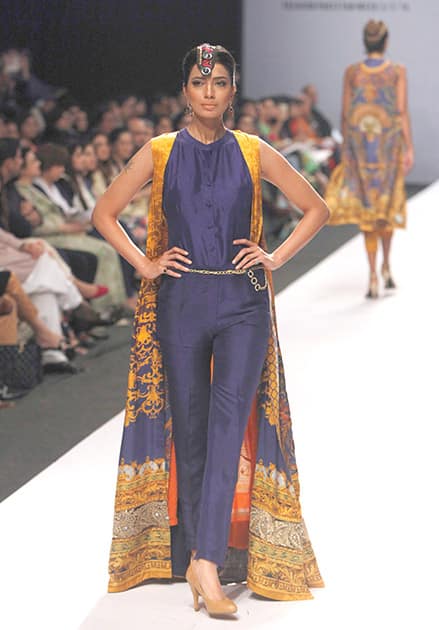  model presents a creation by designer Lamis on the last day of the Fashion Pakistan Week in Karachi.