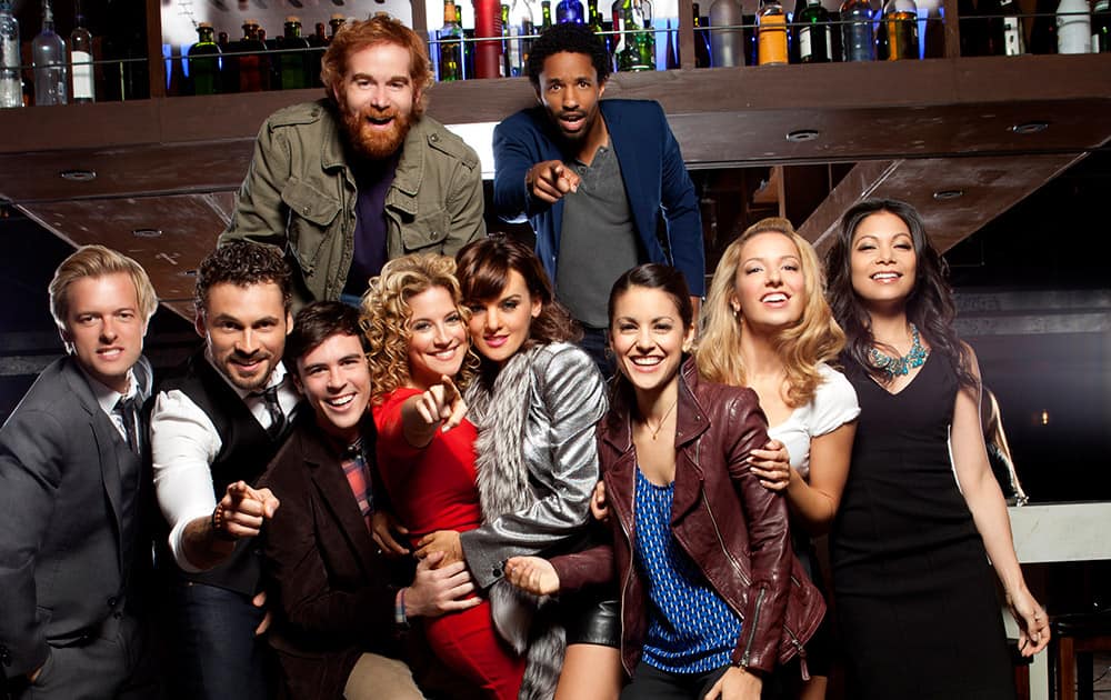 This image released by ABC shows the cast of the new series `Mixology,` top row from left, Andrew Santino and Craig Frank, bottom row from left, Adam Campbell, Adan Canto, Blake Lee, Alexis Carra, Frankie Shaw, Kate Simses, Vanessa Lengies and Ginger Gonzaga. 