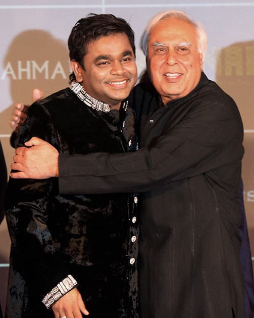 Union Law and IT Minister Kapil Sibal and music composer A R Rahman during the launch of the latter's music album 'Raunaq' in Mumbai. Sibal wrote lyrics for the seven songs in the album. 